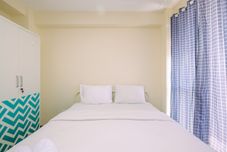 Phòng ngủ Homey and Cozy Living Studio Room Apartment at Tifolia By Travelio