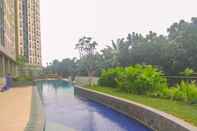 Swimming Pool Good Deal Studio at Transpark Cibubur Apartment By Travelio