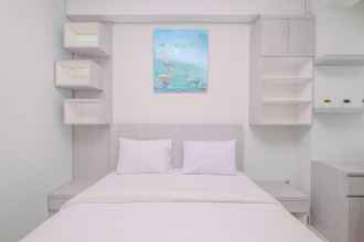 Bedroom 4 Good Deal Studio at Transpark Cibubur Apartment By Travelio