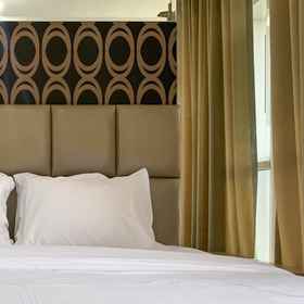 Bedroom 1 Cozy and Tidy Studio Apartment at Tifolia By Travelio, Kantor Garuda Mas Pulo Gadung Hotels