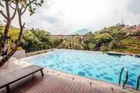 Swimming Pool Cozy Studio Room Apartment at 12th Floor Taman Melati Jatinangor By Travelio