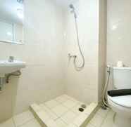 In-room Bathroom 3 Restful Studio Room at Springlake Summarecon Apartment near Mall By Travelio