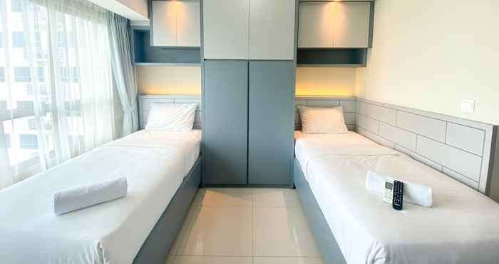 Bedroom Restful Studio Room at Springlake Summarecon Apartment near Mall By Travelio