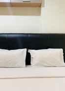 BEDROOM Warm and Homey 1BR Apartment at Belmont Residence Puri By Travelio