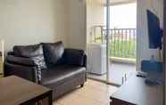 Common Space 2 Warm and Homey 1BR Apartment at Belmont Residence Puri By Travelio