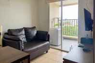 Common Space Warm and Homey 1BR Apartment at Belmont Residence Puri By Travelio