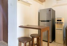 Common Space 3 Warm and Homey 1BR Apartment at Belmont Residence Puri By Travelio