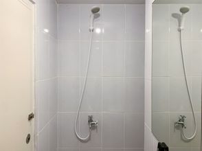 In-room Bathroom 4 Studio with Minimalist Design Apartment at Tokyo Riverside PIK 2 By Travelio