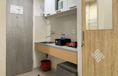 Common Space 2 Cozy Studio Apartment at Osaka Riverview PIK 2 By Travelio