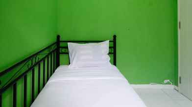 Kamar Tidur 4 Homey and Cozy Living 2BR at East Coast Residence Apartment By Travelio