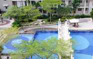 Kolam Renang 6 Homey and Cozy Living 2BR at East Coast Residence Apartment By Travelio