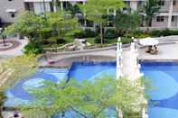 Swimming Pool Homey and Cozy Living 2BR at East Coast Residence Apartment By Travelio