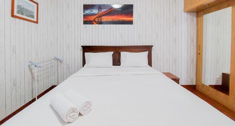 Phòng ngủ 2 Good and Clean Studio Room Apartment at Serpong Greenview By Travelio