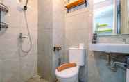 In-room Bathroom 3 Warm and Comfort Studio Room Apartment at Sayana Bekasi By Travelio