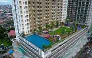 Bangunan 6 Good Deal and Comfy 1BR Apartment at Vida View By Travelio