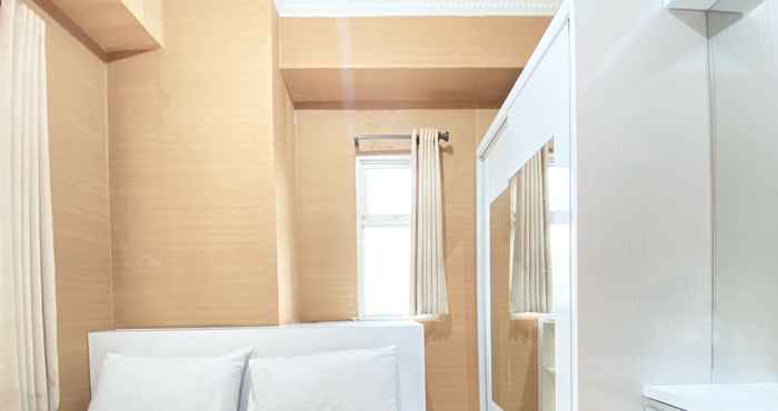 Kamar Tidur Modest 2BR at Suites @Metro Apartment By Travelio