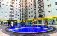 Swimming Pool 6 Modest 2BR at Suites @Metro Apartment By Travelio