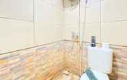 In-room Bathroom 5 Modest 2BR at Suites @Metro Apartment By Travelio
