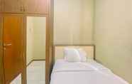 Bedroom 2 Luxury 2BR Apartment at Grand Palace Kemayoran By Travelio