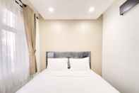 Bedroom Minimalist Designed 2BR Apartment at Grand Asia Afrika By Travelio