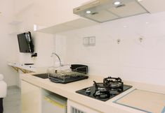 Common Space 2 Stunning and Comfortable Studio Apartment at Sky House BSD near AEON Mall By Travelio