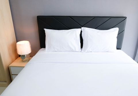 Bedroom Best Choice and Nice Studio at Grand Dharmahusada Lagoon Apartment By Travelio