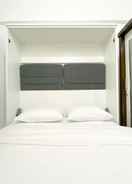 BEDROOM Restful and Tidy Studio Apartment at Sayana Bekasi By Travelio