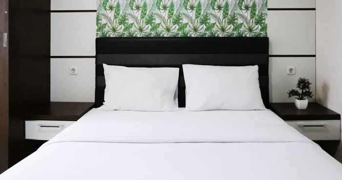 Bedroom Good Deal and Strategic 2BR Apartment at Tamansari Papilio By Travelio