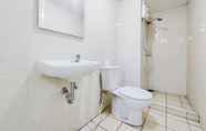 In-room Bathroom 5 Simple and Comfort Design 2BR at M Town Residence Apartment By Travelio