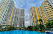 Swimming Pool 6 Modern and Homey 2BR Apartment at Springlake Summarecon Bekasi By Travelio