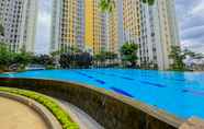 Swimming Pool 7 Modern and Homey 2BR Apartment at Springlake Summarecon Bekasi By Travelio