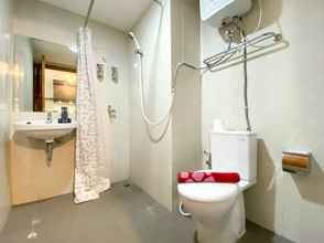 In-room Bathroom 4 Comfy Studio Apartment at Gateway Park LRT City Bekasi By Travelio