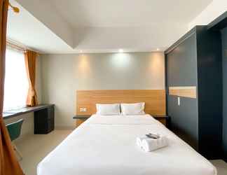 Bedroom 2 Comfy Studio Apartment at Gateway Park LRT City Bekasi By Travelio