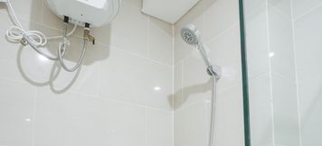 In-room Bathroom 3 Strategic Studio Apartment at Daan Mogot City By Travelio