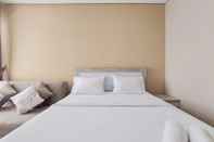 Bedroom Cozy Living Studio Apartment at Transpark Bintaro By Travelio