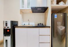 Ruang Umum 2 Cozy Living Studio Apartment at Transpark Bintaro By Travelio