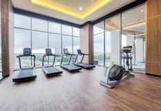 Fitness Center 7 Cozy Living Studio Apartment at Transpark Bintaro By Travelio