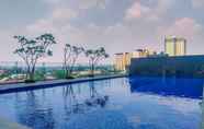 Swimming Pool 7 Combined 3BR without Living Room at Evenciio Margonda Apartment By Travelio