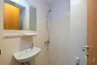 In-room Bathroom Combined 3BR without Living Room at Evenciio Margonda Apartment By Travelio