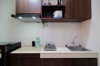 Ruang untuk Umum Combined 3BR without Living Room at Evenciio Margonda Apartment By Travelio