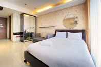 Bedroom Warm and Cozy Studio Apartment at Dago Suites By Travelio