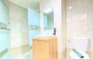 In-room Bathroom 3 Cozy 1BR Apartment at Tamansari La Grande By Travelio