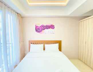 Bedroom 2 Homey Studio Room Apartment at Grand Asia Afrika By Travelio