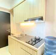 Ruang untuk Umum 2 Homey Studio Room Apartment at Grand Asia Afrika By Travelio