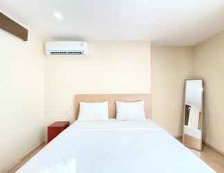 Bedroom 2 Spacious 2BR at Grand Asia Afrika Apartment By Travelio