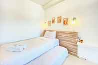 Bedroom Cheerful and Homey 2BR at Parahyangan Residence Apartment By Travelio