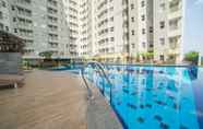 Swimming Pool 6 Cheerful and Homey 2BR at Parahyangan Residence Apartment By Travelio
