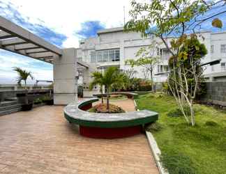 Lobby 2 Cheerful and Homey 2BR at Parahyangan Residence Apartment By Travelio