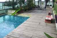 Swimming Pool Spacious 3BR Connected to CITO Mall at Aryaduta Residence Surabaya Apartment By Travelio