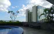 Swimming Pool 6 Relaxing Studio Apartment at Mataram City By Travelio